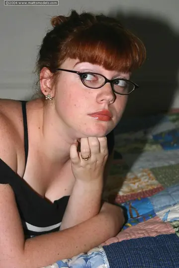 Redhead BBW Removes Glasses and Shows Her Big Tits