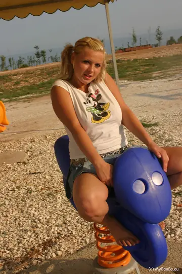 European Blonde Lifts Her Skirt to Show Her Big Natural Tits