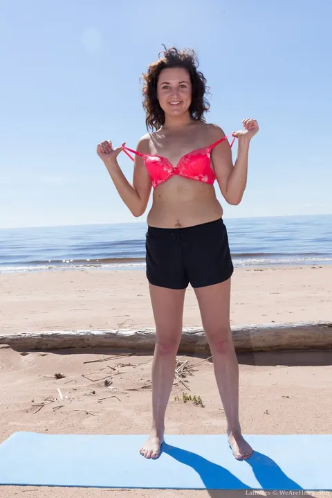 Hairy Woman in a Bikini Spreads Her Pussy on the Beach – photo 3 of 16