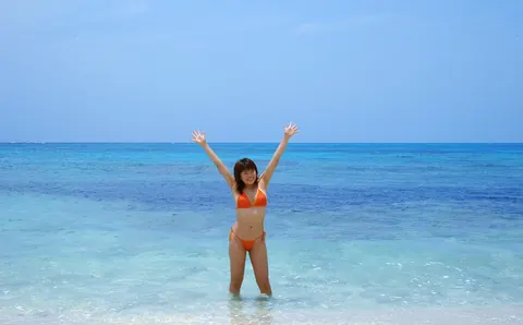 Japanese Redhead Strips Off Her Bikini for Sex on the Beach – photo 1 of 16