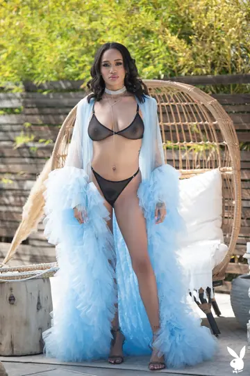 Busty Ebony Brunette in a Bikini Fingers Herself Outdoors