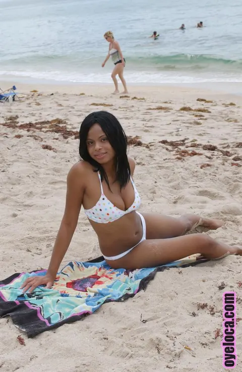 Nina Bell: Busty Ebony Latina Suns Her Tits in a Bikini on the Beach – photo 14 of 16