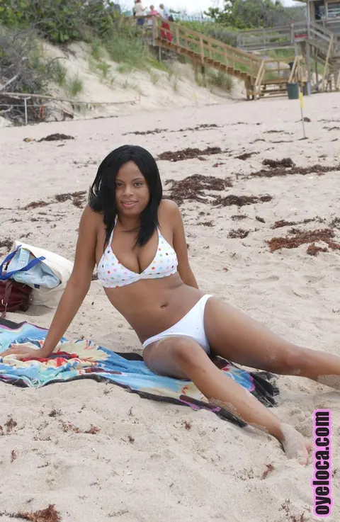 Nina Bell: Busty Ebony Latina Suns Her Tits in a Bikini on the Beach – photo 11 of 16