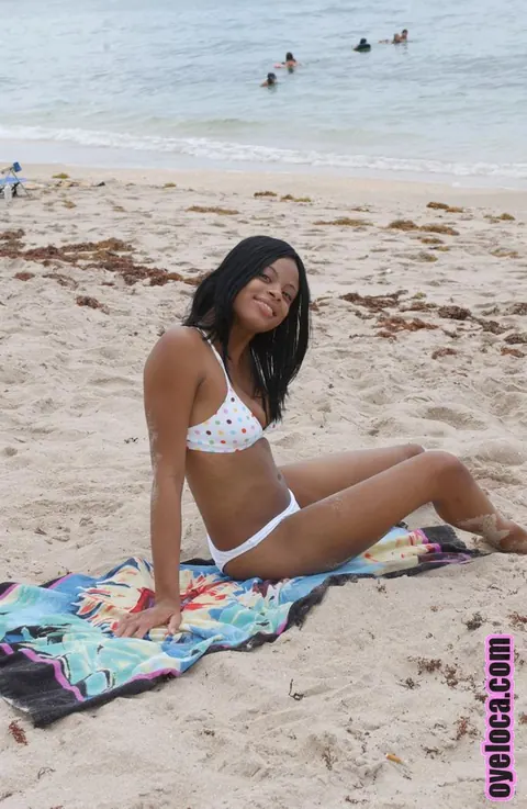 Nina Bell: Busty Ebony Latina Suns Her Tits in a Bikini on the Beach – photo 13 of 16