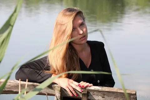 Woman Strips Out of Her Jeans and Spreads on a Dock Bench – photo 1 of 16