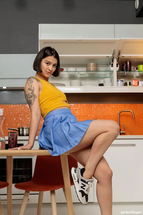 Sasha X Ray: Short-Haired Brunette Lifts Her Skirt and Spreads in the Kitchen – photo 1 of 21