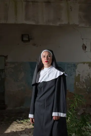 Ukrainian Brunette Nun Strips and Spreads Her Shaved Pussy