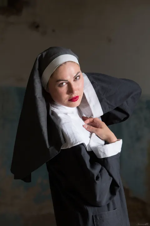 Judith Able: Ukrainian Brunette Nun Strips and Spreads Her Shaved Pussy – photo 3 of 21