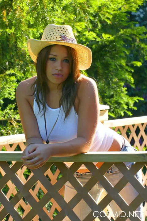 Busty Redhead Undoes Her Jeans and Spreads Outdoors – photo 11 of 16