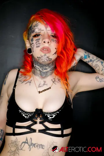 Tattooed Redhead in Lingerie Takes Anal Creampie on the Sofa