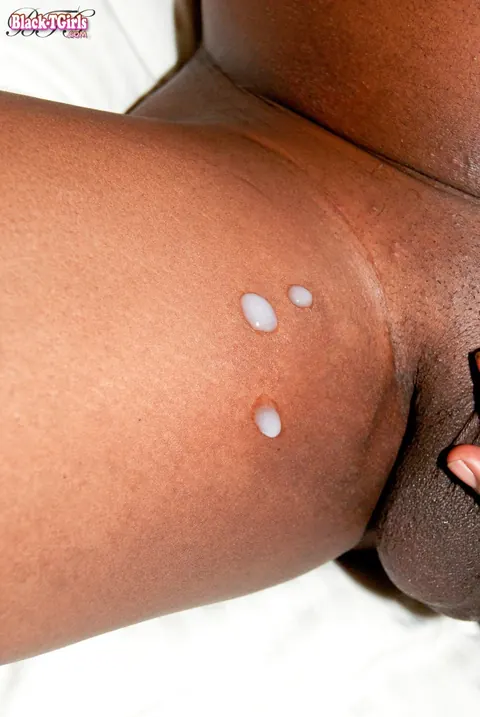Ebony Trans Woman Undresses and Cums in the Bedroom – photo 16 of 16