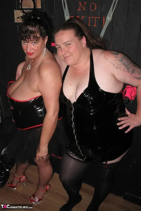 Mature BBW in Leather Plays Bondage and Licks Pussy in Dungeon – photo 1 of 16