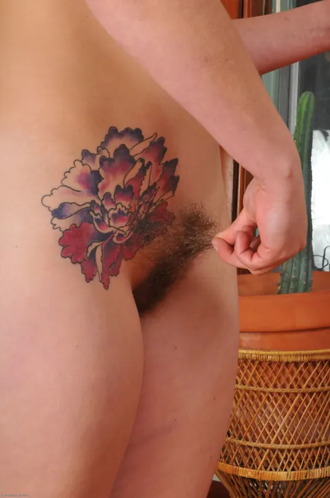 Thick Short-Haired Woman Spreads Her Hairy Pussy Standing – photo 21 of 21