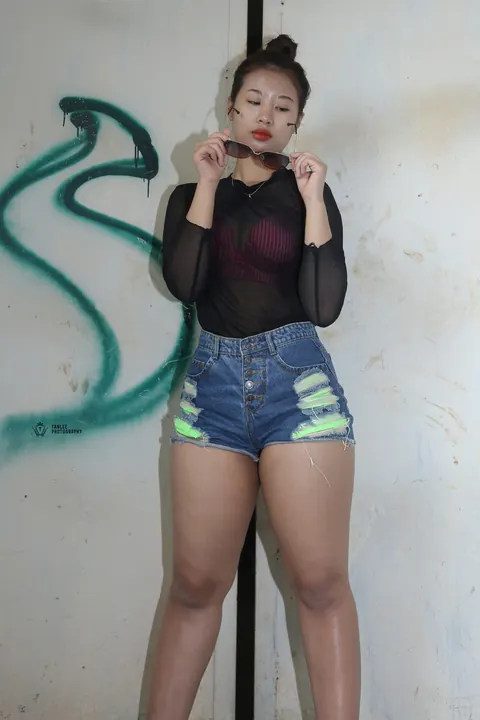 Busty Asian Brunette Strips Out of Her Shorts and Glasses – photo 19 of 21
