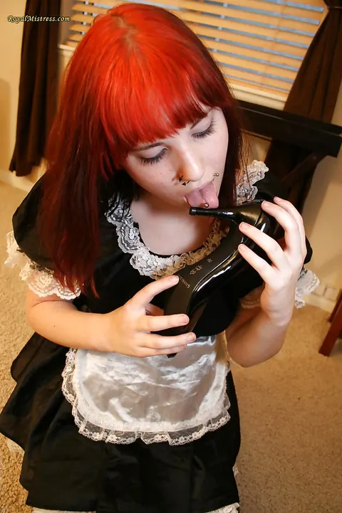 Redhead in a Maid Uniform Shows Off Her Feet in Stockings – photo 3 of 12