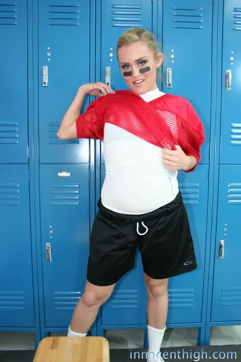 Ruby Ryder: Short-Haired Brunette Strips Off Her Football Uniform in the Locker Room – photo 10 of 19