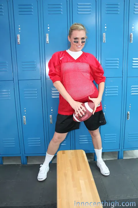 Ruby Ryder: Short-Haired Brunette Strips Off Her Football Uniform in the Locker Room – photo 7 of 19