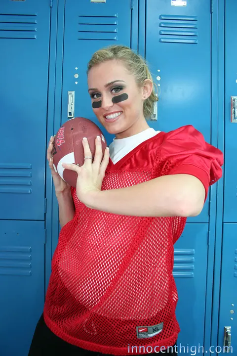 Ruby Ryder: Short-Haired Brunette Strips Off Her Football Uniform in the Locker Room – photo 8 of 19