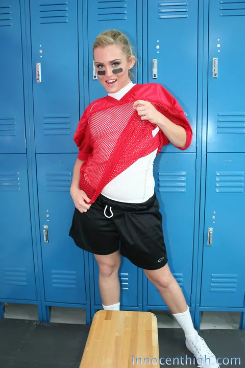 Ruby Ryder: Short-Haired Brunette Strips Off Her Football Uniform in the Locker Room – photo 9 of 19
