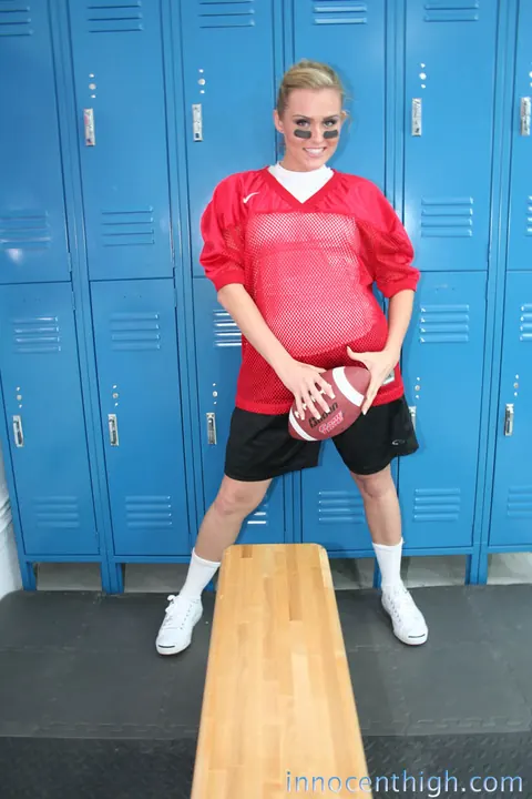 Ruby Ryder: Short-Haired Brunette Strips Off Her Football Uniform in the Locker Room – photo 6 of 19