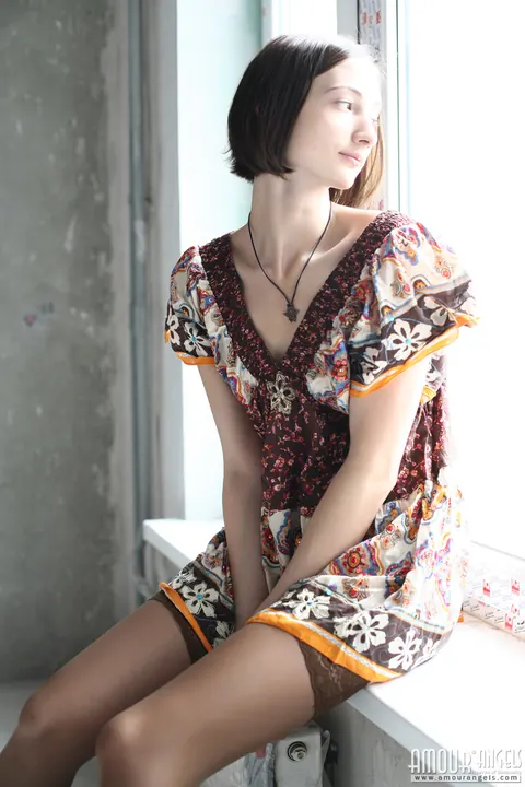 Skinny Brunette Shows Off Her Small Tits on the Window Sill – photo 5 of 20