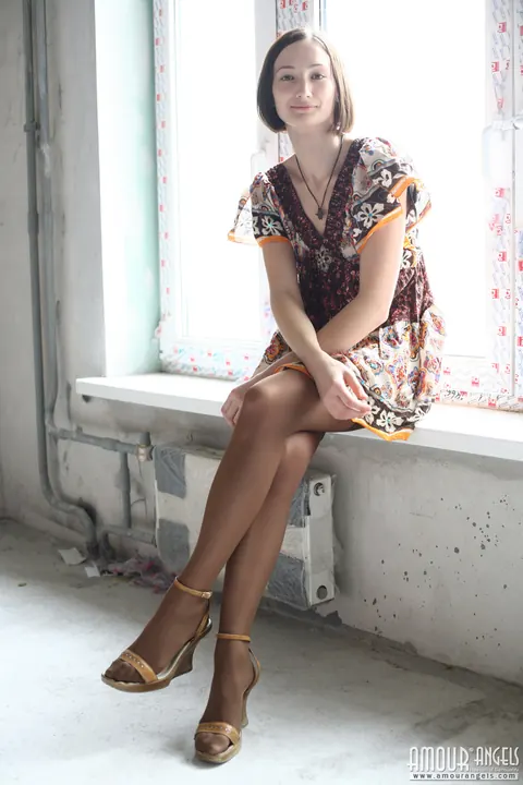 Skinny Brunette Shows Off Her Small Tits on the Window Sill – photo 3 of 20