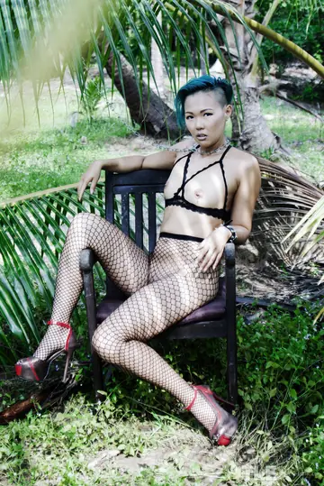 Sweet Julie – Asian Woman in Fishnet Pantyhose Spreads Her Pussy Outdoors