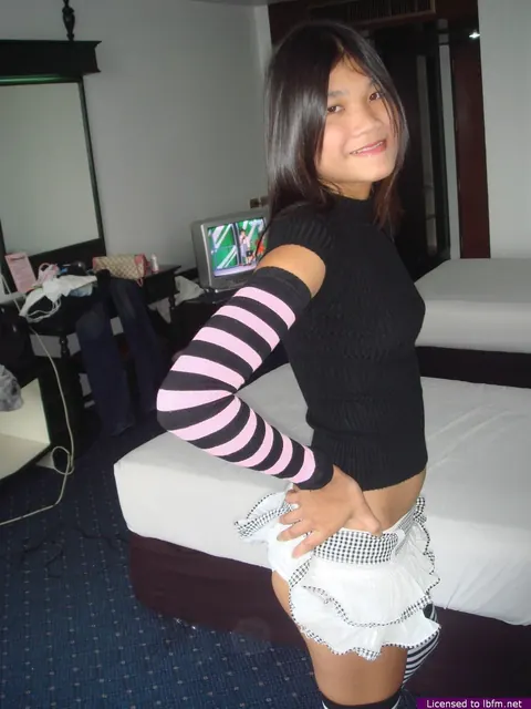 Asian Woman Drinks Beer and Strips to Stockings and Socks Before Spreading – photo 4 of 16