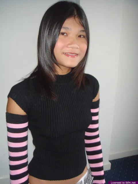 Asian Woman Drinks Beer and Strips to Stockings and Socks Before Spreading – photo 2 of 16