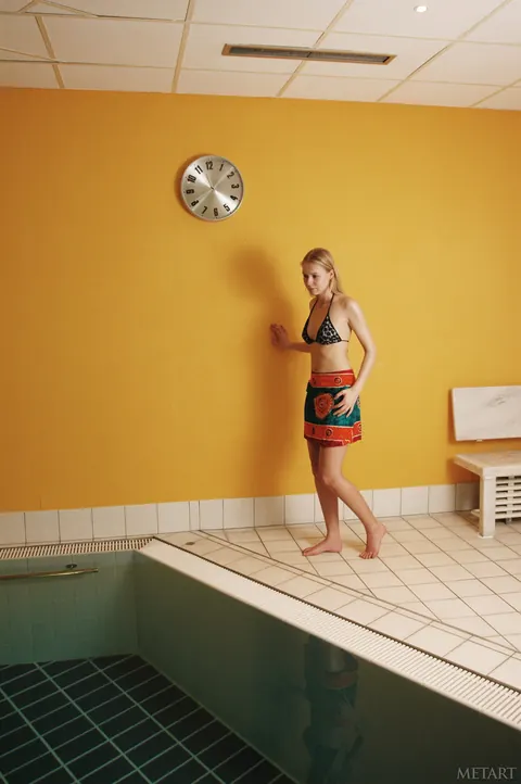 German Blonde Strips Out of Her Bikini by the Pool – photo 1 of 21