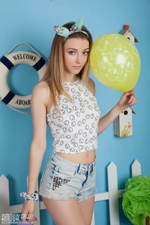 Skinny European Uncovers Natural Tits with Balloons – photo 2 of 20