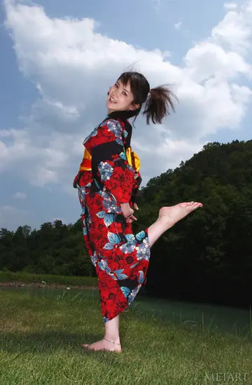 Asian Woman Strips Out of Her Skirt and Panties Outdoors