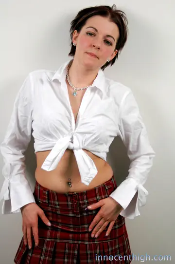 Alicia Avery – Brunette with Short Hair Lifts Her Skirt Against the Wall