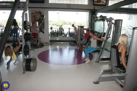 MILF in Yoga Pants and Shorts Strips at the Gym – photo 20 of 21