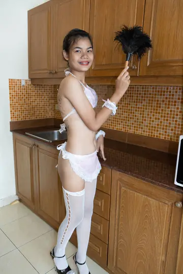 Petite Thai Babe Spreads Her Shaved Pussy