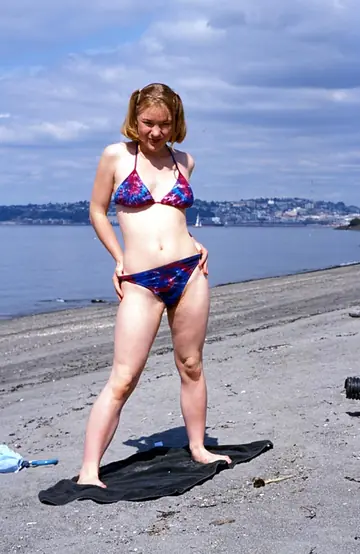 Short-Haired Babe Sucks and Rides on the Beach