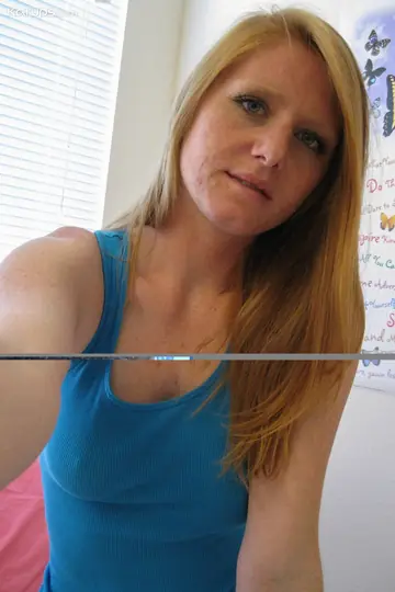 Pale Redhead Amateur Rides a Sybian and Spreads