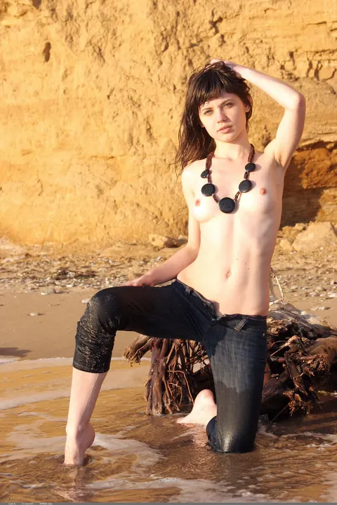 Lusi A: Petite Brunette Strips Out of Her Jeans on the Beach – photo 7 of 21