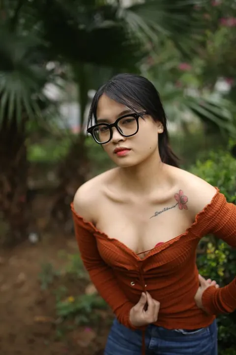 Asian Brunette with Big Tits Reveals Her Chest Outdoors in Jeans – photo 10 of 20