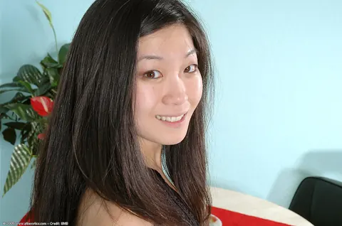 Asian Brunette Pulls Down Her Yoga Pants and Spreads Her Pussy – photo 1 of 16