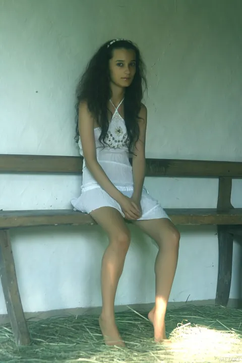 Slim Curly Brunette Strips Out of Her Skirt in the Forest – photo 3 of 21