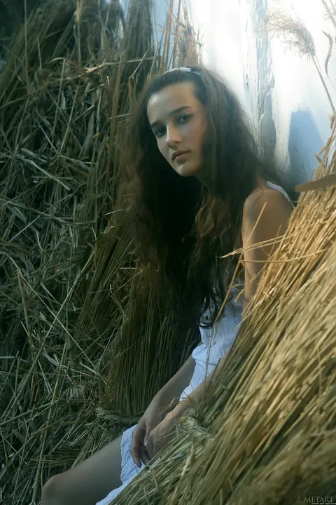 Slim Curly Brunette Strips Out of Her Skirt in the Forest – photo 9 of 21
