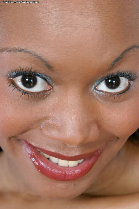 Ebony Babe Spreads Her Shaved Pussy Wide for the Camera – photo 16 of 16