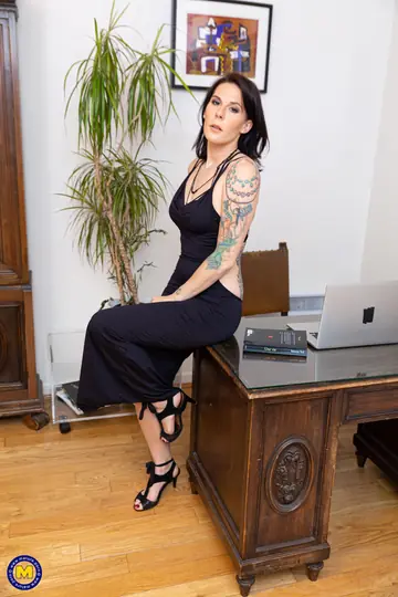Tattooed Mature Secretary Strips and Spreads in the Office