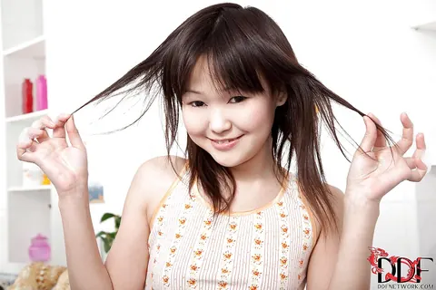 Asian Brunette Strips Nude and Poses in the Bathroom – photo 3 of 16