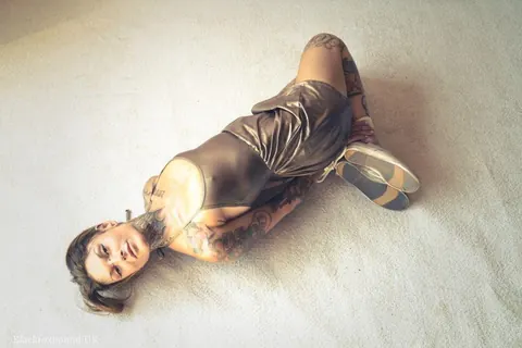 Tattooed Brunette Bound in a Hogtie Wearing a Skirt – photo 14 of 16