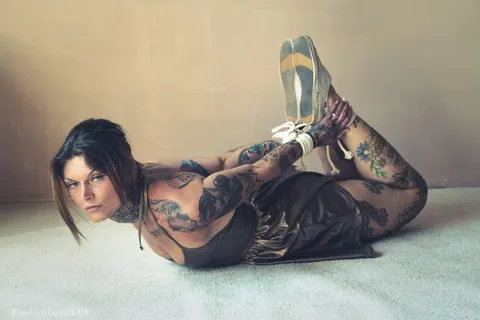 Tattooed Brunette Bound in a Hogtie Wearing a Skirt – photo 11 of 16