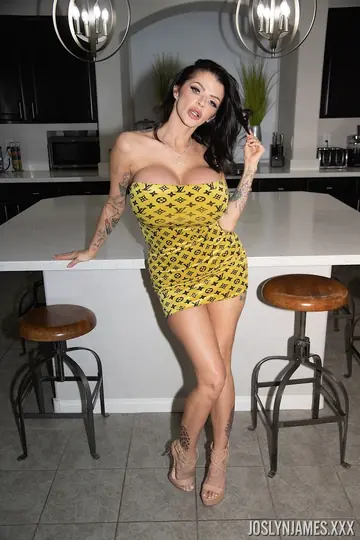 Brunette MILF in a Yellow Dress Spreads Her Pussy in the Kitchen