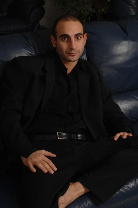 Guy Strips and Strokes to Cumshot on the Sofa – photo 2 of 21