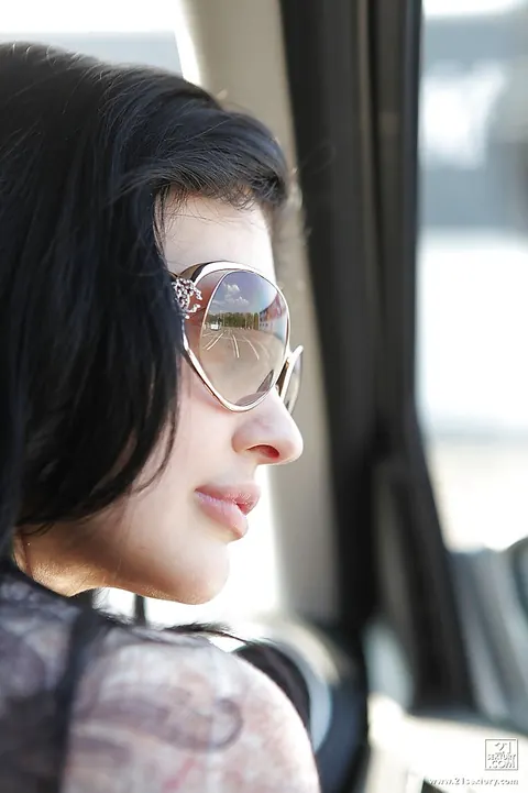 Aletta Ocean: Short-Haired Brunette in Jeans and Glasses Poses Outdoors – photo 12 of 16